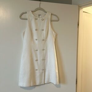 Mini white tweed dress with gold buttons